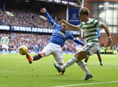 Celtic's Jota (R) and Rangers' Aaron Ramsey during the last match between the two at Ibrox.