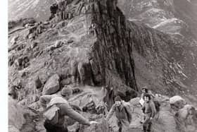 Scaling the peaks with club members
