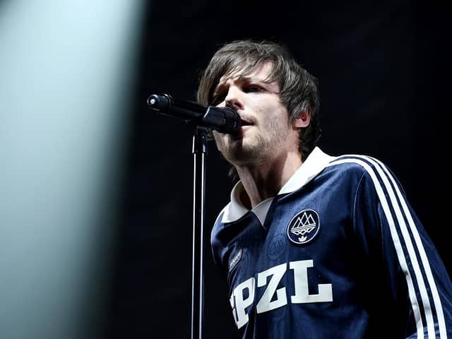 Louis Tomlinson performs on stage during Free Radio Hits Live in Birmingham. (Pic credit: Jeff Spicer / Getty Images)