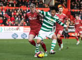 Reo Hatate and Ross McCrorie in action during a cinch Premiership match between Aberdeen and Celtic.