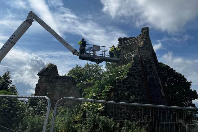 Crane was used to allow workers to get a better view of the required work. (Pics: Carluke High Mill team)