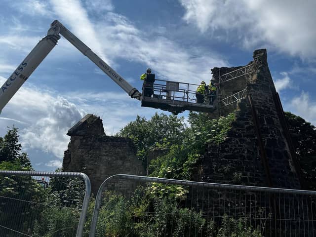 Crane was used to allow workers to get a better view of the required work. (Pics: Carluke High Mill team)