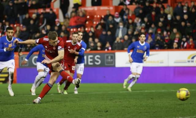 ABERDEEN, SCOTLAND - JANAURY 18: Aberdeen's Lewis Ferguson makes it 1-1 from the penalty spot during a Cinch Premiership match between Aberdeen and Rangers at Pittodrie, on January 18, 2022, in Aberdeen, Scotland. (Photo by Craig Williamson / SNS Group)