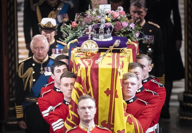 King Charles III and members of the royal family follow behind the coffin of Queen Elizabeth II, draped in the Royal Standard with the Imperial State Crown and the Sovereign's orb and sceptre, as it is carried out of Westminster Abbey after her State Funeral. Picture date: Monday September 19, 2022.
See PA story FUNERAL Queen. Photo credit should read: Danny Lawson/PA Wire