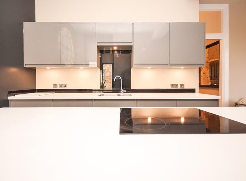 It has a fully-fitted, modern kitchen.