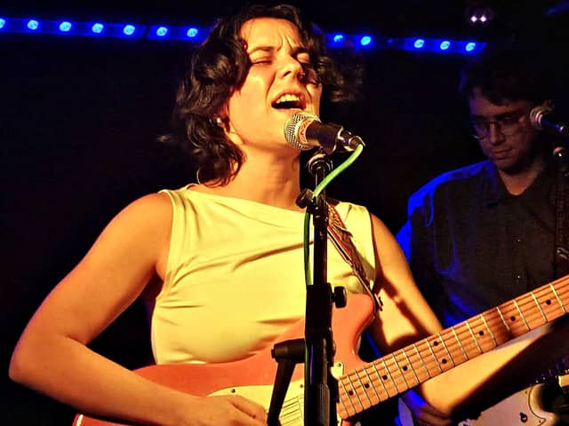 Tilly Scantlebury performing with her band