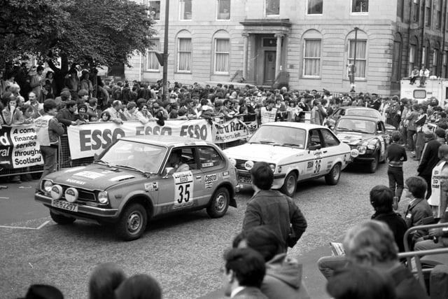 Crowds watching the rally cars leave Glasgow on the first stage of the International Scottish Motor Rally in June 1979.