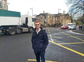 MSP Ross Greer at Bearsden Cross with the primary school in background