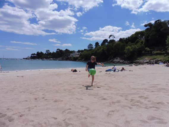 Tom playing on the beach in Brittany.