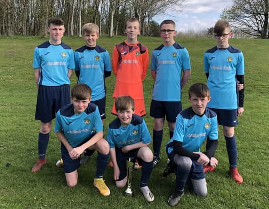 Milton Rovers 2008 boys with Futsal Cup trophy in Strathaven