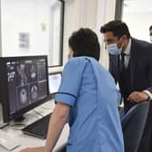 Health Secretary Humza Yousaf unveiling the scanner