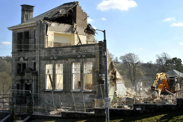 The former Lesmahagow High School being demolished in 2009; it will now house new homes.