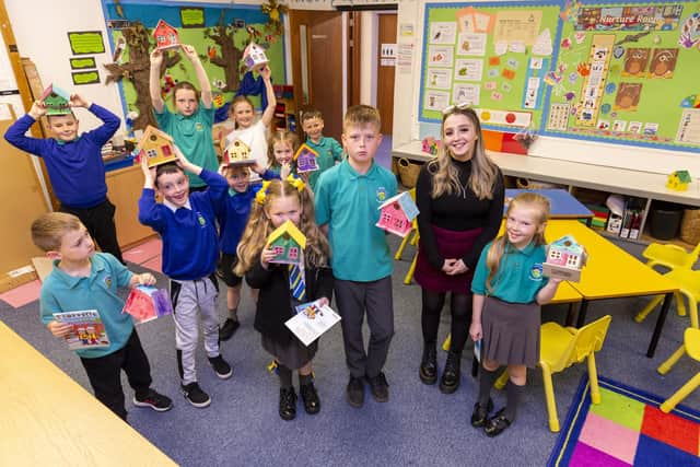 The youngsters from Hillview Primary show off their bird box designs. Pic: Iain McLean