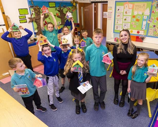 The youngsters from Hillview Primary show off their bird box designs. Pic: Iain McLean