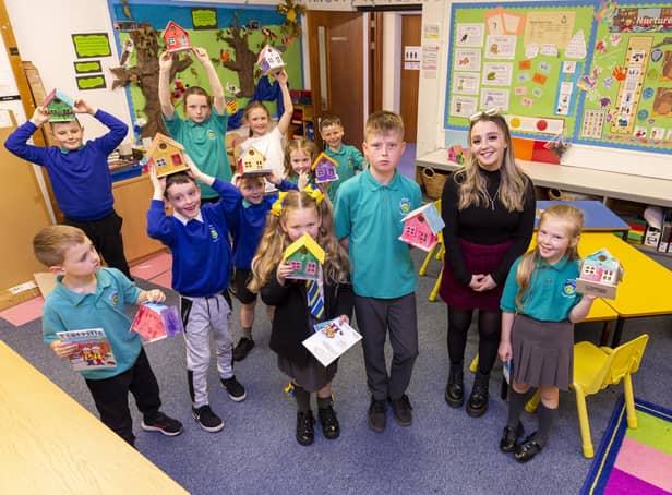 The youngsters from Hillview Primary show off their bird box designs. Pic: Iain McLean