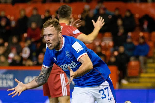 Rangers substitute Scott Arfield celebrates his dramatic late winner against Aberdeen at Pittodrie. (Photo by Craig Williamson / SNS Group)