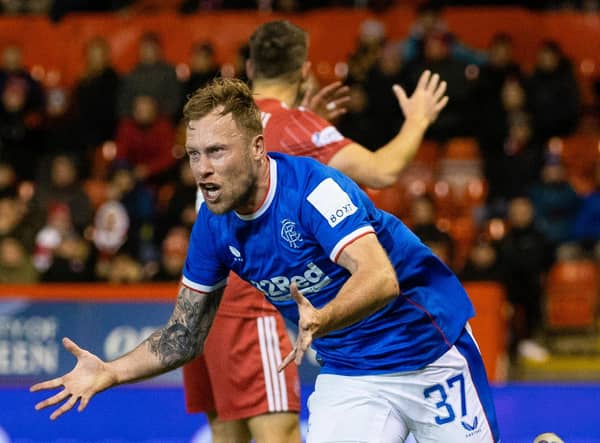 Rangers substitute Scott Arfield celebrates his dramatic late winner against Aberdeen at Pittodrie. (Photo by Craig Williamson / SNS Group)