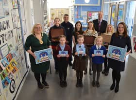 Dep Provost pictured with card winners Georgia, Eilidh, Emily, and the Provost