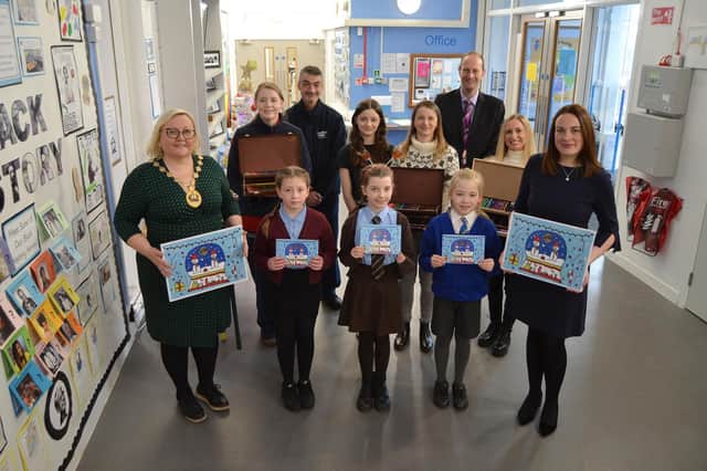 Dep Provost pictured with card winners Georgia, Eilidh, Emily, and the Provost