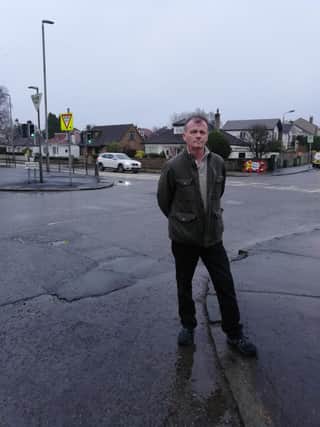 Councillor Gibbons at the junction