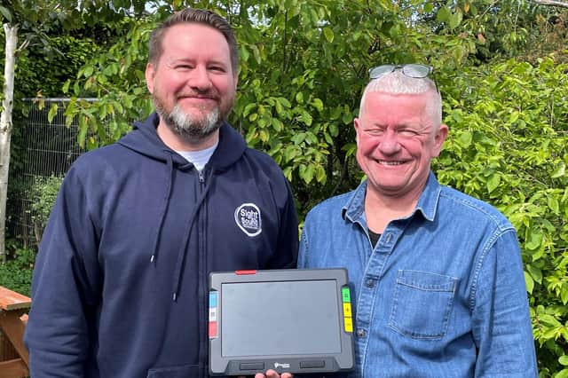 Graeme Marden from Sight & Sound with Russell Macmillan of ERGC, holding a Ruby 10 visual aid