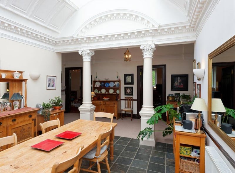 The dining room gets lot of light from the cupola.