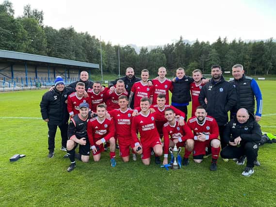 Gaffer Daryl Meikle (back, 1st left) and his delighted Lesmahagow AFC players and backroom staff after cup win