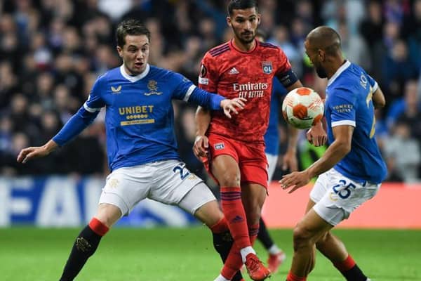 Scott Wright and Kemar Roofe in action against Lyon in the Europa League. (Photo by Craig Foy / SNS Group)