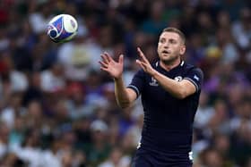 MARSEILLE, FRANCE - SEPTEMBER 10:  Finn Russell of Scotland catches the ball during the Rugby World Cup France 2023 Group B match between South Africa and Scotland at Stade Velodrome on September 10, 2023 in Marseille, France. (Photo by David Rogers/Getty Images)