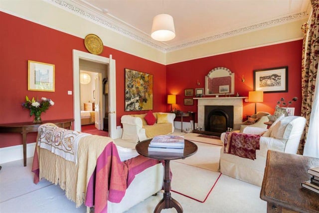 The drawing room has a feature fireplace.