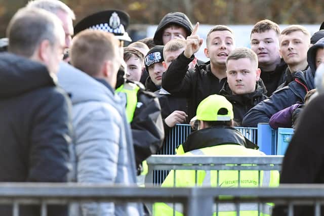 Rangers fans gather outside McDiarmid Park as the team leave the stadium following the 2-1 defeat to St Johnstone. (Photo by Ross MacDonald / SNS Group)