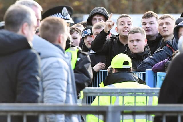 Rangers fans gather outside McDiarmid Park as the team leave the stadium following the 2-1 defeat to St Johnstone. (Photo by Ross MacDonald / SNS Group)