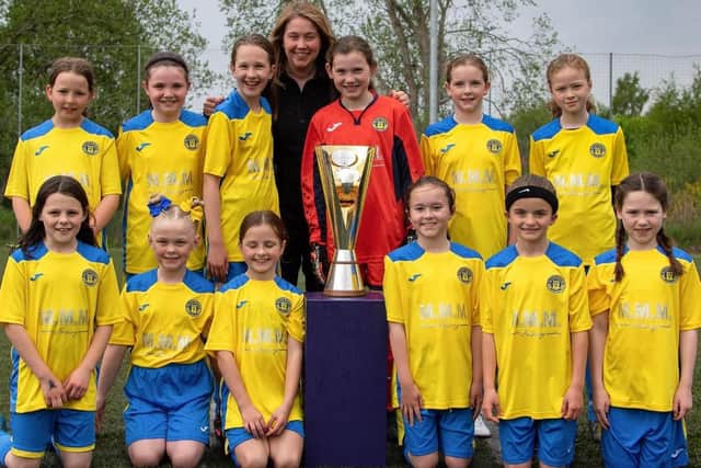 Aileen Campbell with members of another of the girls' teams at Milton Rovers