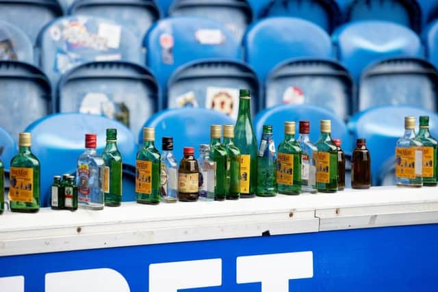 A collection of glass bottles left behind at Ibrox after Sunday's Old Firm match which Celtic won 2-1 to go six points clear at the top of the Premiership.  (Photo by Craig Williamson / SNS Group)