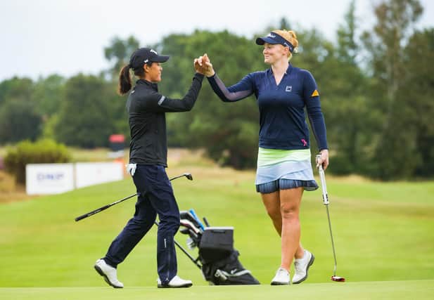 Kylie Henry (right) congratulates Celine Boutier on her winning putt on the final hole at last week's French Open (pic: Tristan Jones/LET)