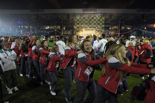 Athletes celebrate during the closing ceremony.