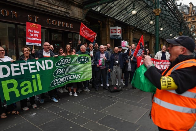 Striking workers outside Glasgow Central.