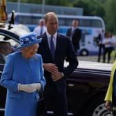 Queen Elizabeth II and the Duke of Cambridge, known as the Earl of Strathearn in Scotland, arrive for a visit to AG Barr's factory in Cumbernauld, where the Irn-Bru drink is manufactured, as part of her traditional trip to Scotland for Holyrood Week. Picture date: Monday June 28, 2021. PA Photo. The visit marks the 95-year-old's first official visit north of the border since the death of her husband, the Duke of Edinburgh. See PA story ROYAL Queen. Photo credit should read: Andrew Milligan/PA Wire