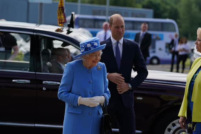 Queen Elizabeth II and the Duke of Cambridge, known as the Earl of Strathearn in Scotland, arrive for a visit to AG Barr's factory in Cumbernauld, where the Irn-Bru drink is manufactured, as part of her traditional trip to Scotland for Holyrood Week. Picture date: Monday June 28, 2021. PA Photo. The visit marks the 95-year-old's first official visit north of the border since the death of her husband, the Duke of Edinburgh. See PA story ROYAL Queen. Photo credit should read: Andrew Milligan/PA Wire