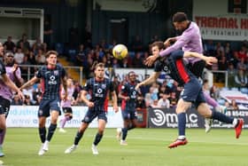 Connor Goldson climbs above Ross County defender Alex Iacovitti to head Rangers 2-0 in front in Dingwall. (Photo by Alan Harvey / SNS Group)