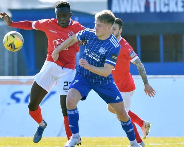 Two-goal Peterhead hero Hamish Ritchie with Clyde's Ewan Otoo (pic: Duncan Brown)