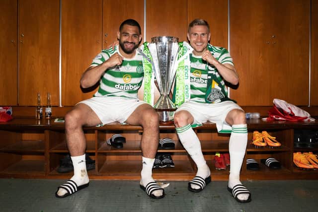 Celtic defensive partners Cameron Carter-Vickers and Carl Starfelt pose with the cinch Premiership trophy. (Photo by Craig Williamson / SNS Group)