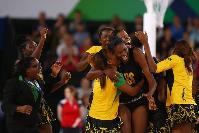 The Jamaican team celebrate victory in the bronze medal netball match between Jamaica and England at the SECC Precinct during day eleven of the Glasgow 2014 Commonwealth Games on August 3, 2014 in Glasgow.