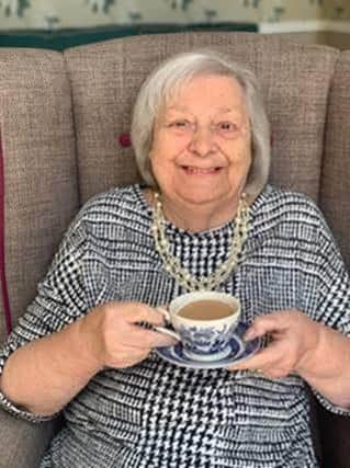 Resident Patricia Algeo enjoying a cuppa for National Tea Day