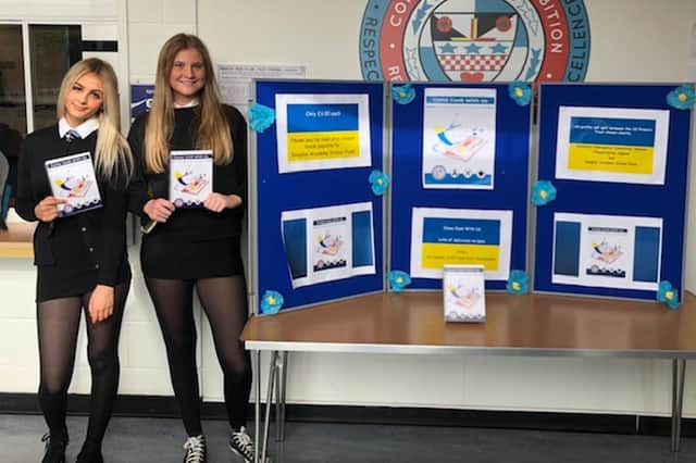 S3 pupils Pia Cochrane and Sophie Burke show off ‘Come Cook With Us ’