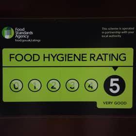 A Food Standards Agency rating sticker on a window of a restaurant in central London. A huge variation in food hygiene standards remains across the UK, with one in five high or medium-risk food outlets failing to meet standards, according to a study.