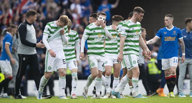 Celtic players look dejected after the 2-1 defeat to Rangers at Hampden. (Photo by Craig Foy / SNS Group)