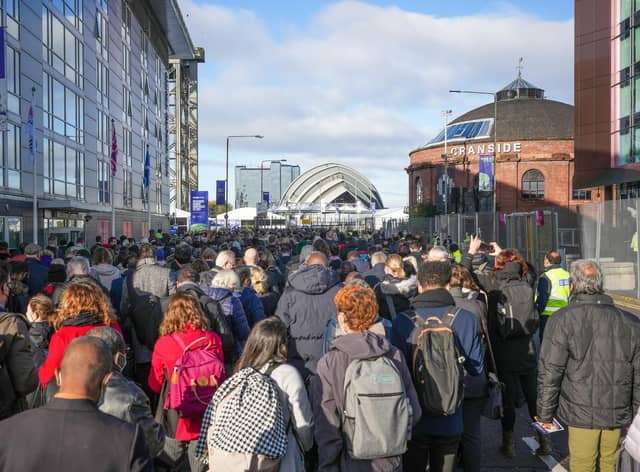 Delegates queue at security the on day three of COP26 on Tuesday in Glasgow. Photo by Christopher Furlong/Getty Images