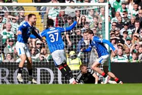Rangers' Ryan Naderi (right) celebrates scoring in victory over Celtic. (Photo by Andrew Milligan/PA Wire)