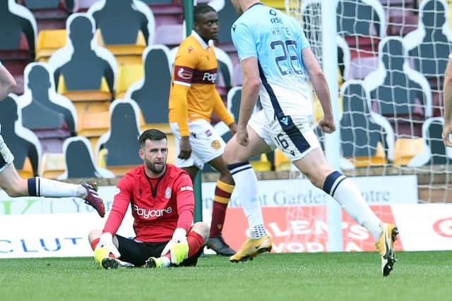 'Well keeper Liam Kelly looks disconsolate after County goal (Pics by Ian McFadyen)